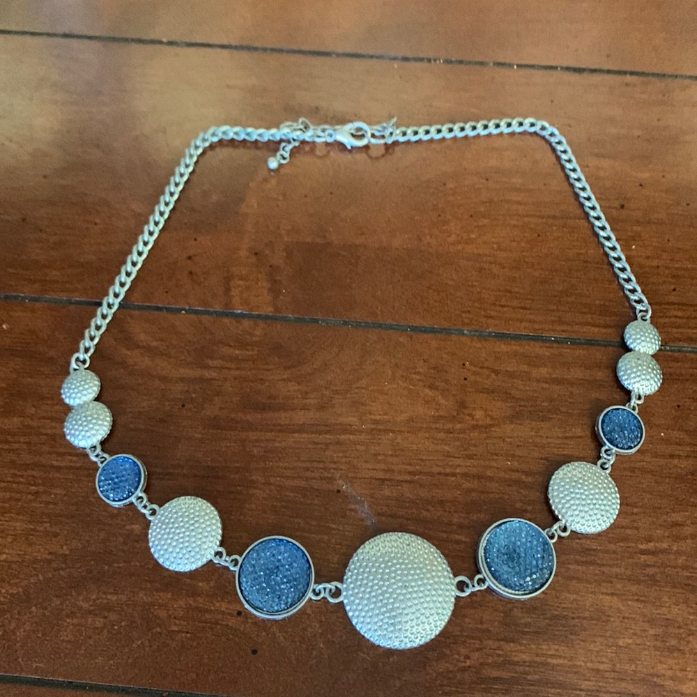Blue crystal and silver colored medallion necklace & earring set
